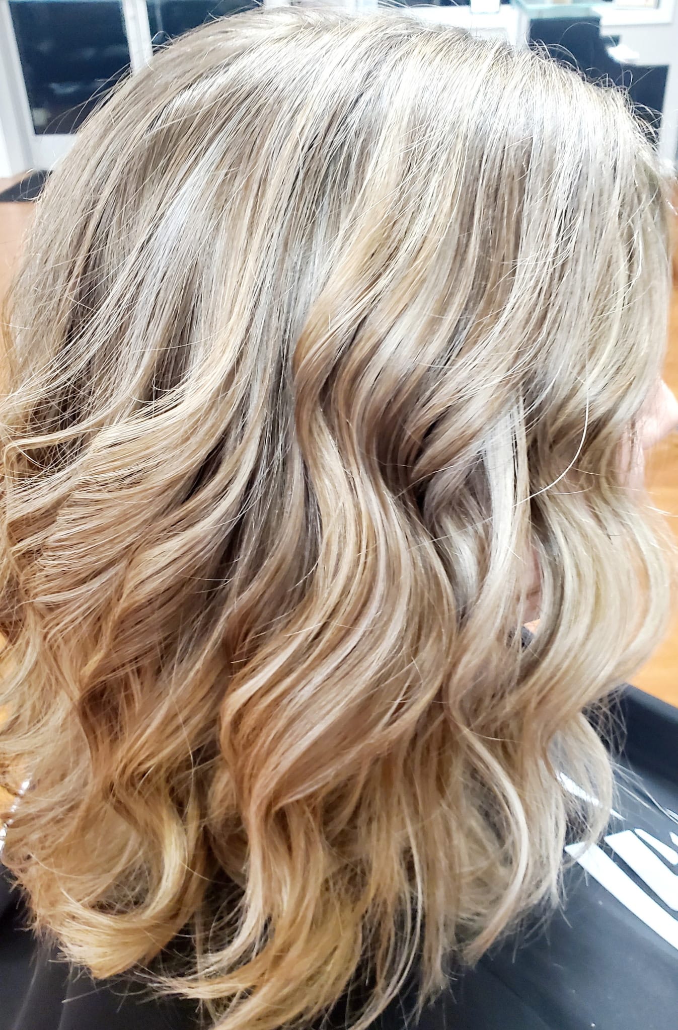 Soft waves and curls — finished cut and style